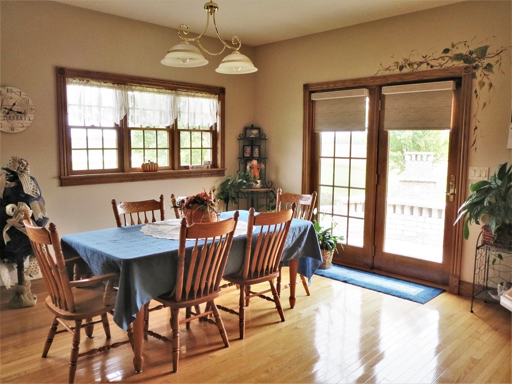1122 Sterling Road Dixon, IL 61021 - Photo 5 of 45 a view of a dining room with furniture window and outside view