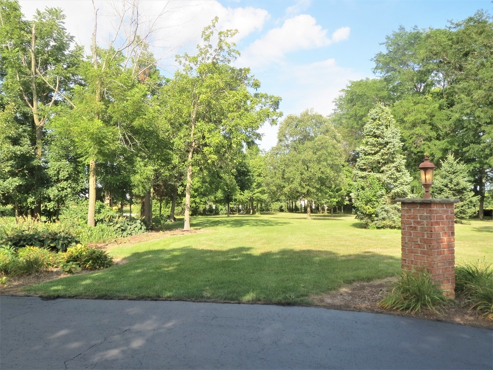 1122 Sterling Road Dixon, IL 61021 - Photo 41 of 45 a view of a yard with a house