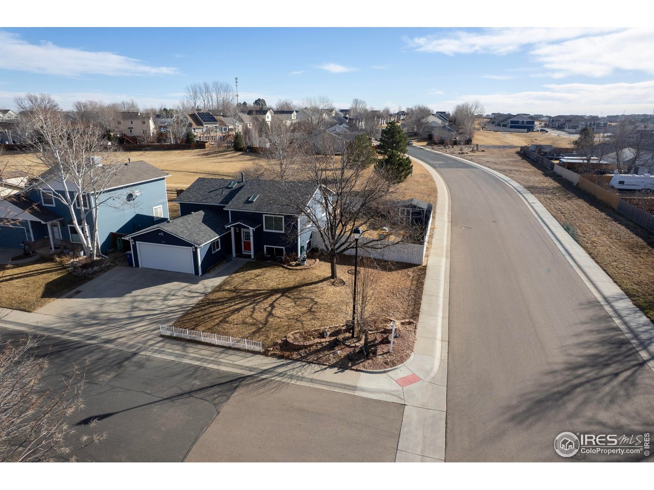 124 Adams Way Firestone, CO 80520 - Photo 29 of 34 a view of a terrace with skyline