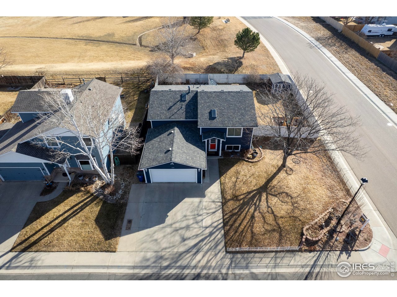 124 Adams Way Firestone, CO 80520 - Photo 30 of 34 a view of house with outdoor space