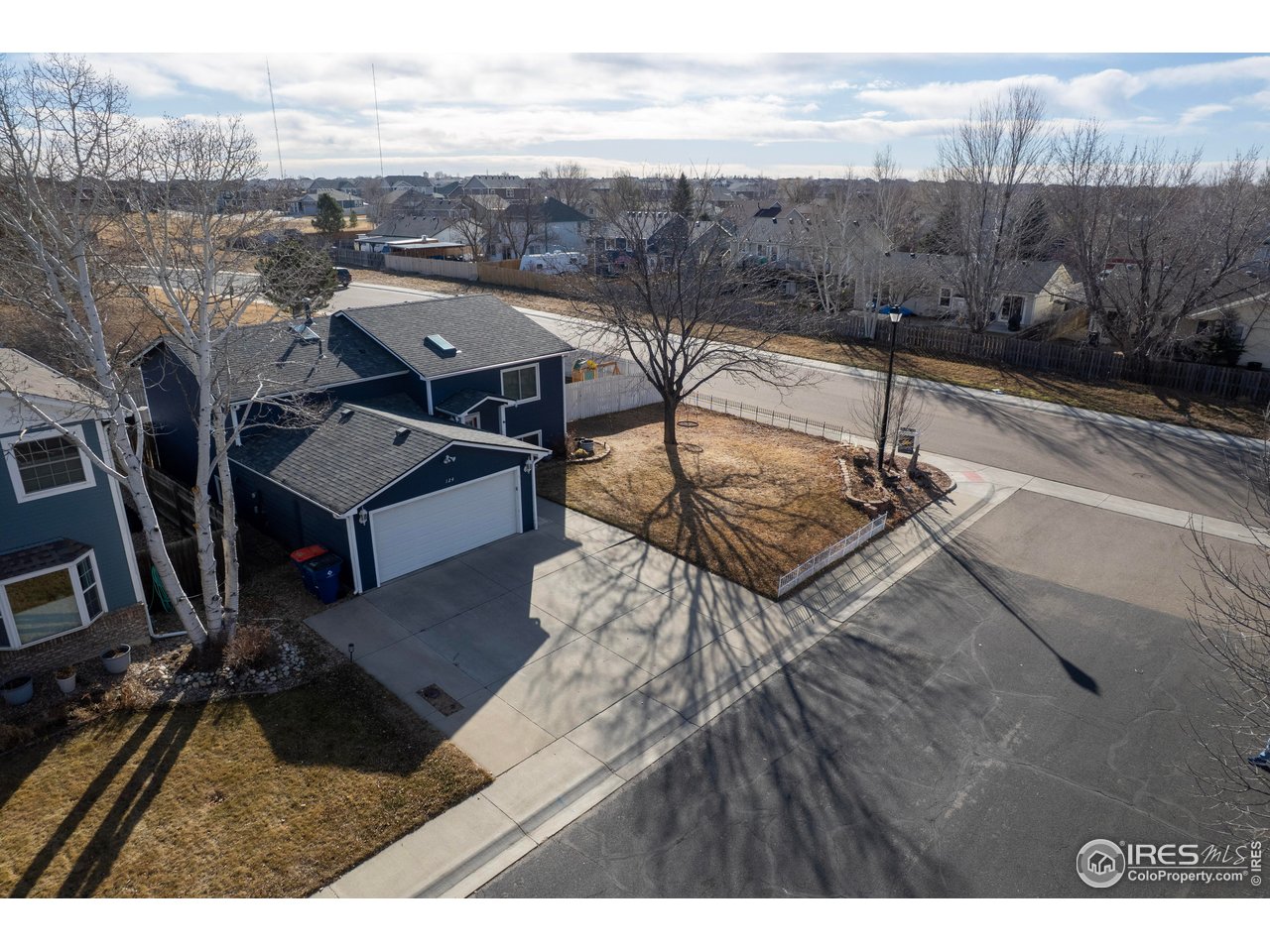 124 Adams Way Firestone, CO 80520 - Photo 31 of 34 a view of a terrace with sky view