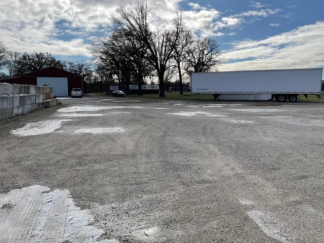 a bench sitting in middle of a yard