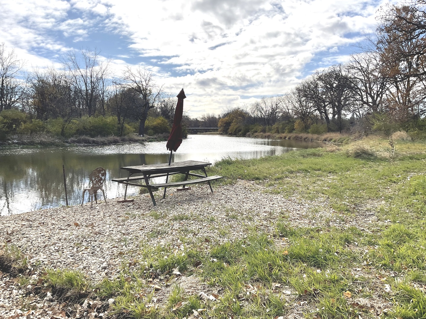 6010-6060 East Minooka Road Minooka, IL 60447 - Photo 21 of 24 a view of a lake with a yard