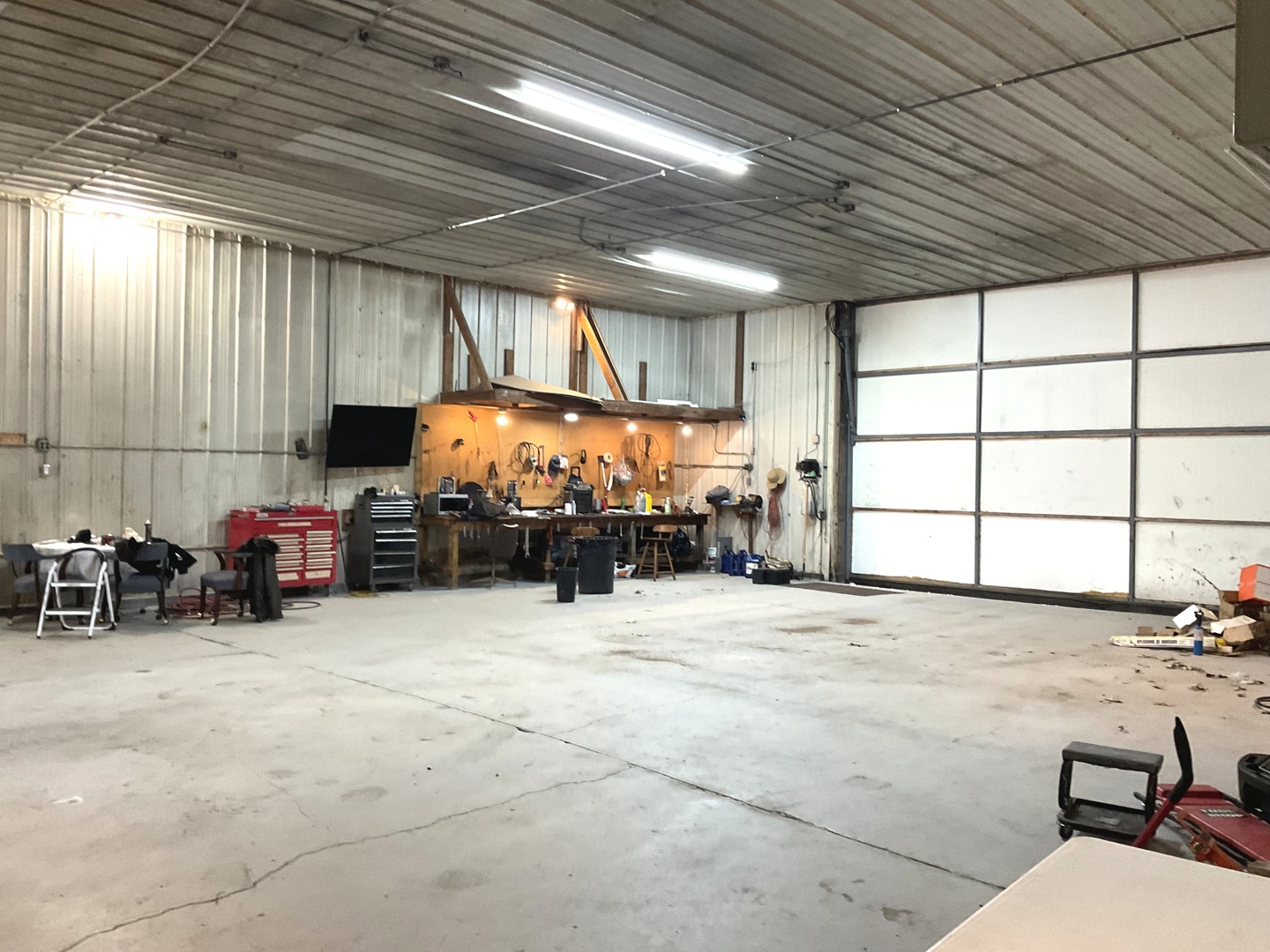 6010-6060 East Minooka Road Minooka, IL 60447 - Photo 4 of 24 a view of a room with gym equipment and a large window