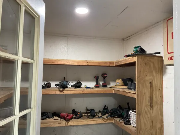 a room with storage and utility room