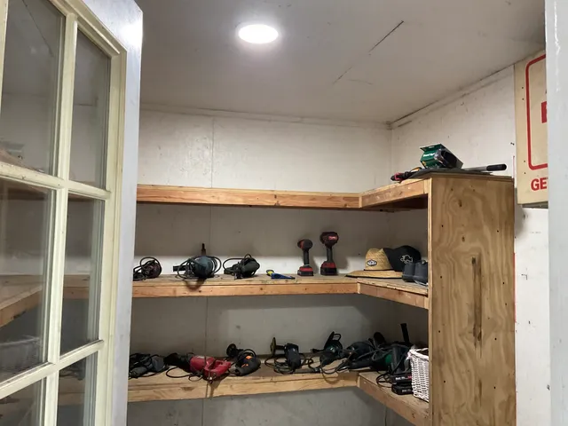 a room with storage and utility room