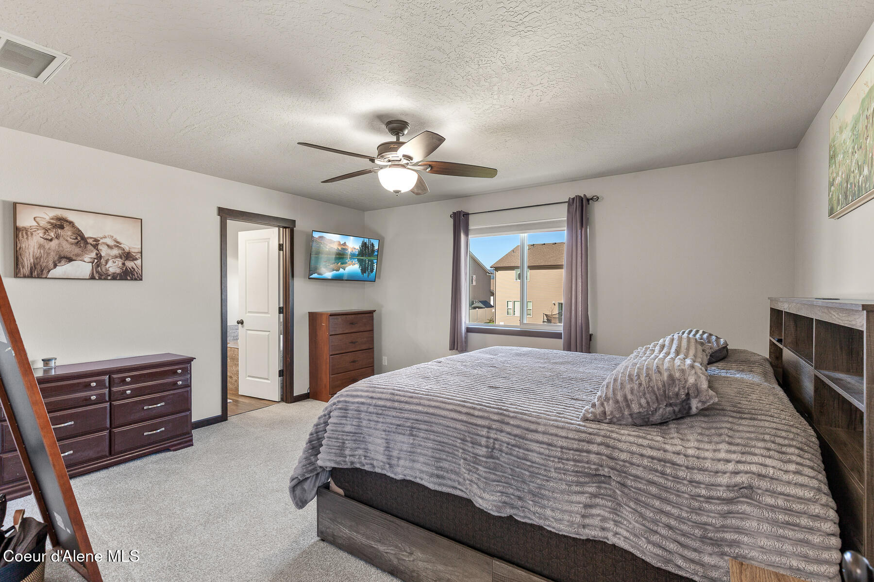 12365 West Renshaw Avenue Post Falls, ID 83854 - Photo 21 of 35 Master Suite