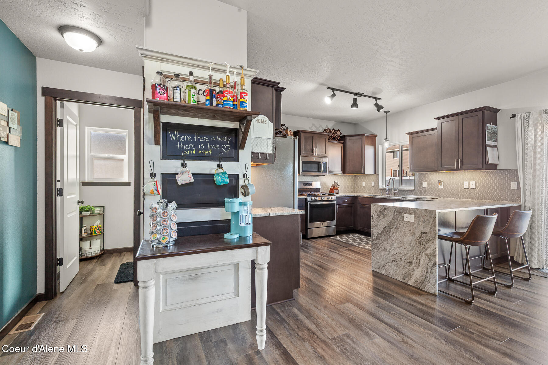 12365 West Renshaw Avenue Post Falls, ID 83854 - Photo 9 of 35 LVP Flooring