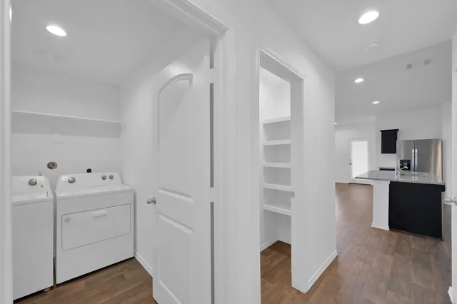 a view of cabinets and wooden floor