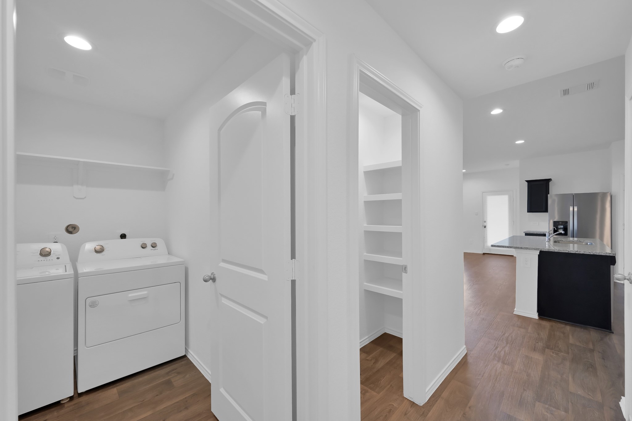 21391 Owl Road New Caney, TX 77357 - Photo 11 of 13 a view of cabinets and wooden floor