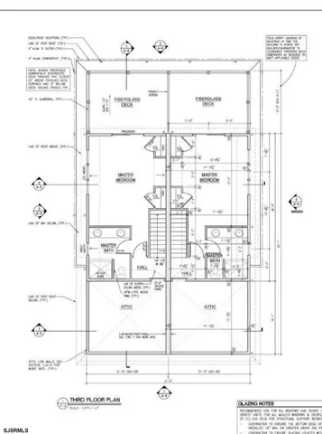 a black and white photo of a living room