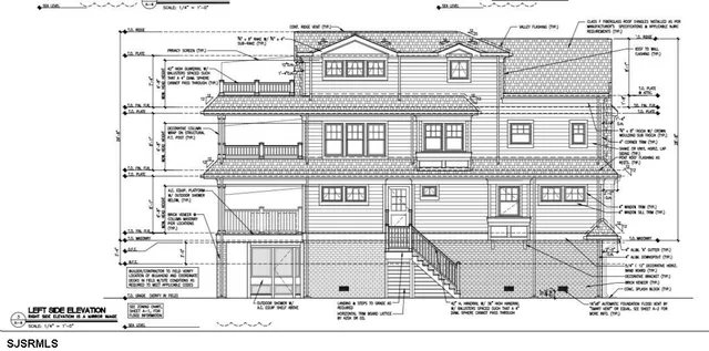 a black and white photo of a living room