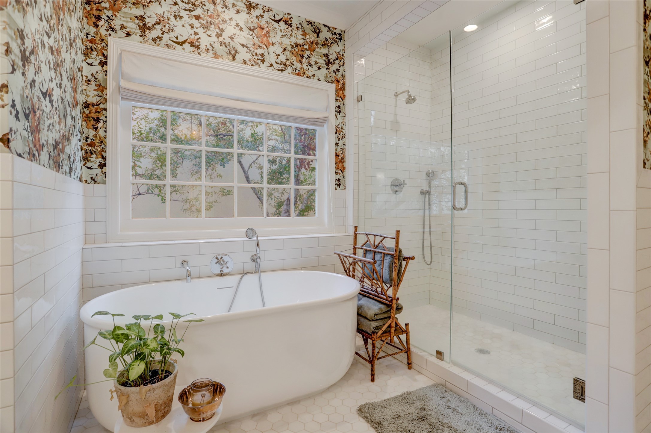 2703 Mid Lane, Unit 4 Houston, TX 77027 - Photo 11 of 16 a white bath tub sitting next to a window
