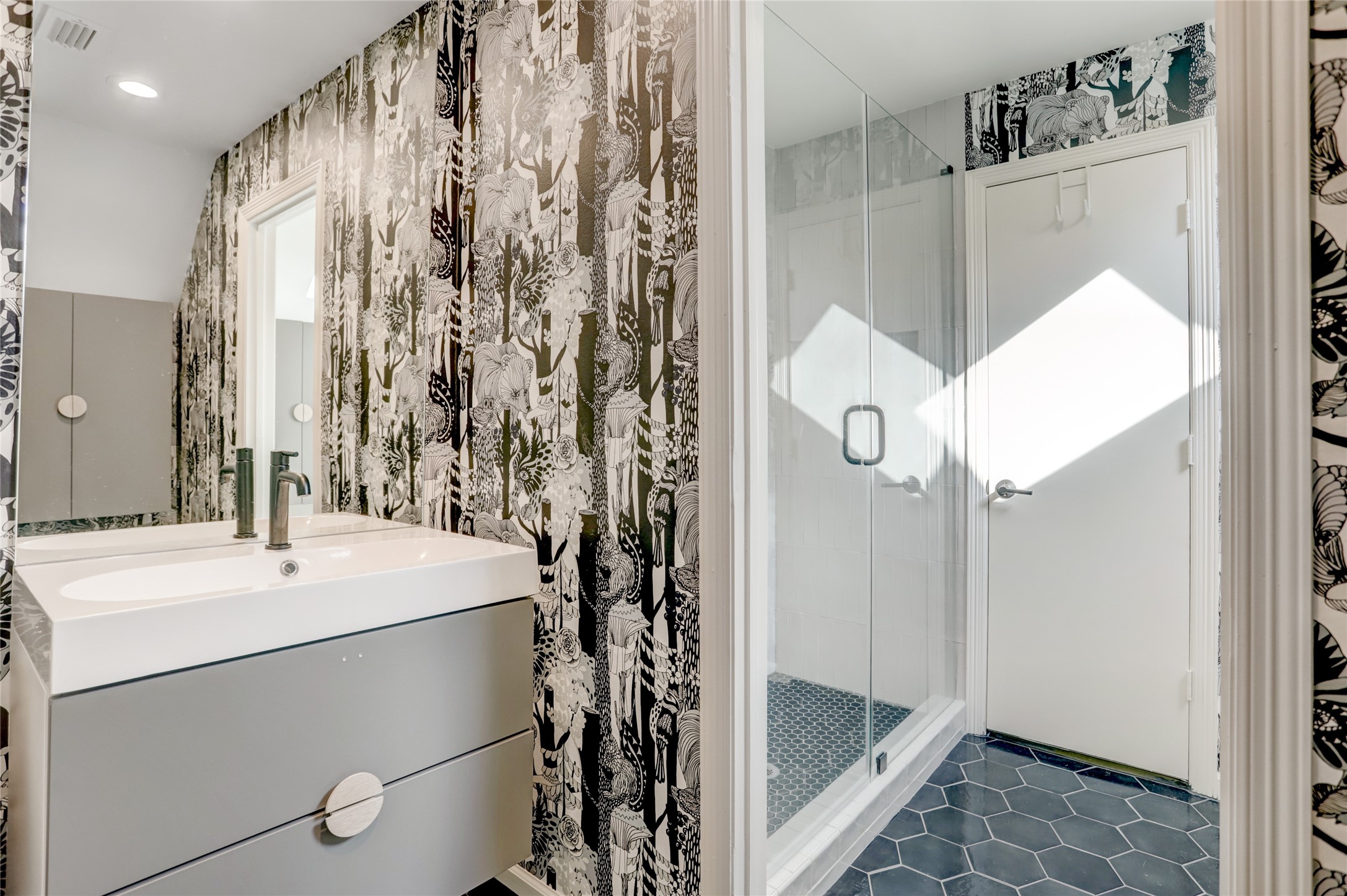 2703 Mid Lane, Unit 4 Houston, TX 77027 - Photo 16 of 16 a bathroom with a shower and a sink