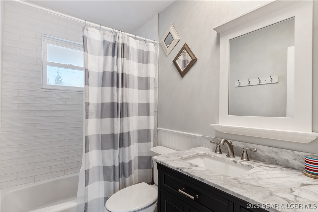 2100 Spring Cove Road Sunrise Beach, MO 65079 - Photo 17 of 54 remodeled hall bath