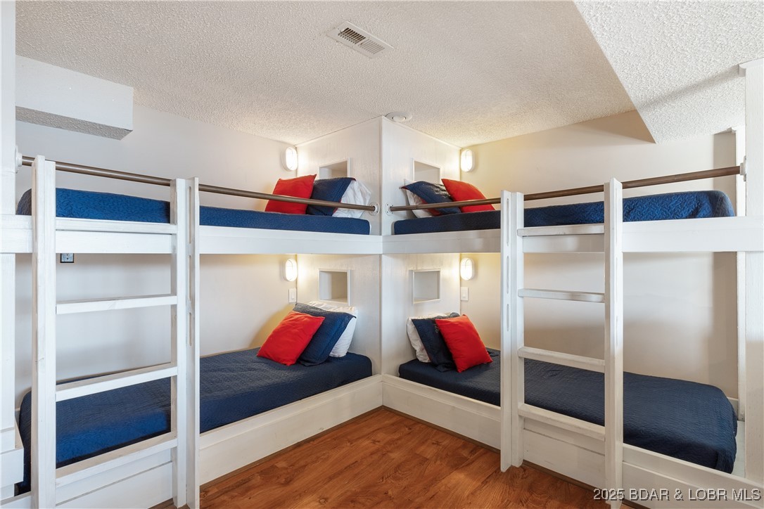 2100 Spring Cove Road Sunrise Beach, MO 65079 - Photo 19 of 54 cool bunk area downstaira
