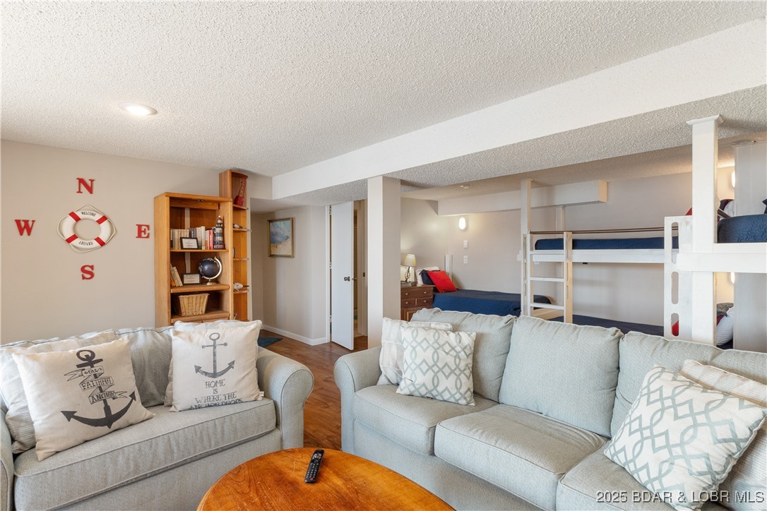 2100 Spring Cove Road Sunrise Beach, MO 65079 - Photo 20 of 54 family room lower level