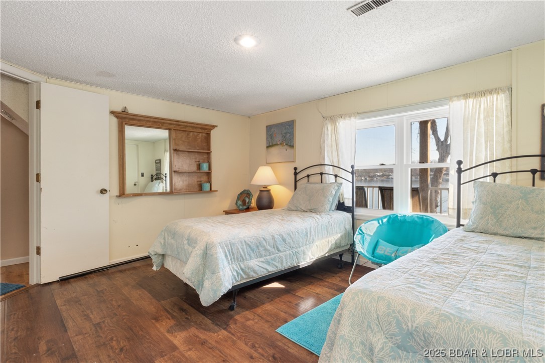 2100 Spring Cove Road Sunrise Beach, MO 65079 - Photo 23 of 54 lower level bedroom