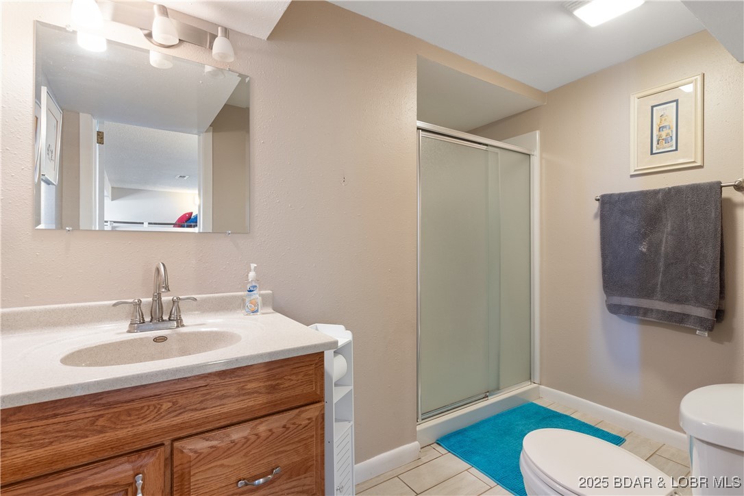 2100 Spring Cove Road Sunrise Beach, MO 65079 - Photo 25 of 54 lower level bath