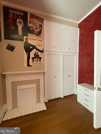 a view of an entryway with wooden floor