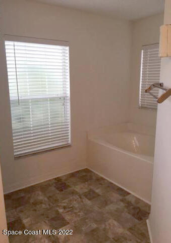 3312 Merrick Avenue Rockledge, FL 32955 - Photo 14 of 30 a view of an empty room with a window