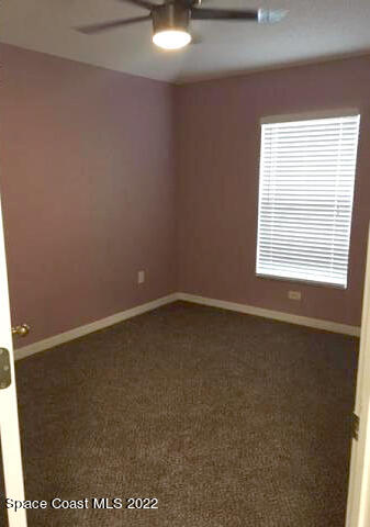 3312 Merrick Avenue Rockledge, FL 32955 - Photo 17 of 30 an empty room with a window