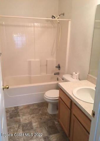 3312 Merrick Avenue Rockledge, FL 32955 - Photo 18 of 30 a bathroom with a sink a toilet and a bathtub