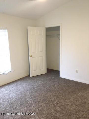 3312 Merrick Avenue Rockledge, FL 32955 - Photo 21 of 30 an empty room with closet