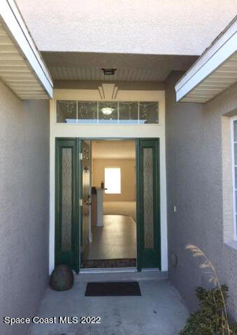 3312 Merrick Avenue Rockledge, FL 32955 - Photo 4 of 30 a view of a room with a door