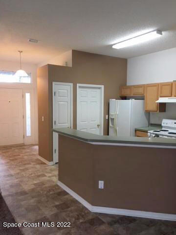 3312 Merrick Avenue Rockledge, FL 32955 - Photo 6 of 30 a view of kitchen with cabinets