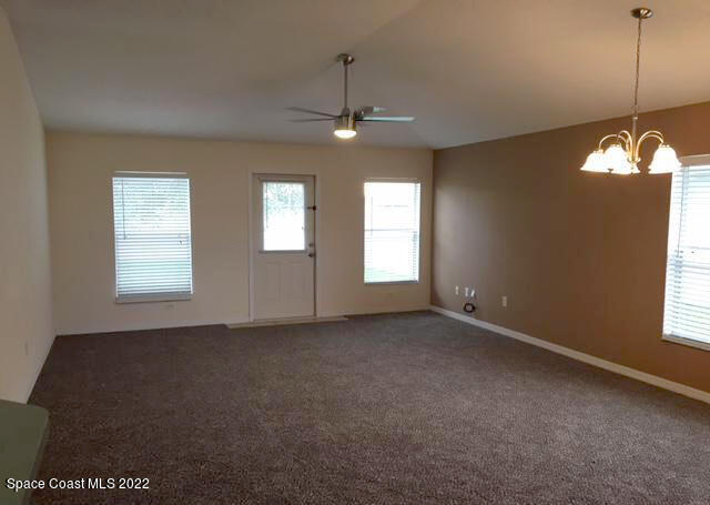 3312 Merrick Avenue Rockledge, FL 32955 - Photo 8 of 30 a view of an empty room with a window
