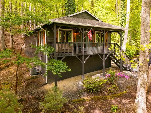 a front view of a house with yard