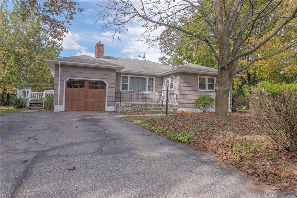 6 Elizabeth Road Danbury, CT 06811 - Photo 1 of 1 a front view of a house with garden