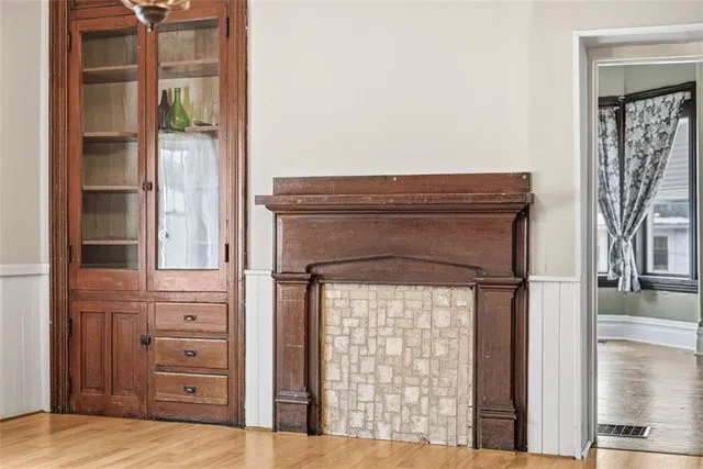 a view of walk in closet with empty room