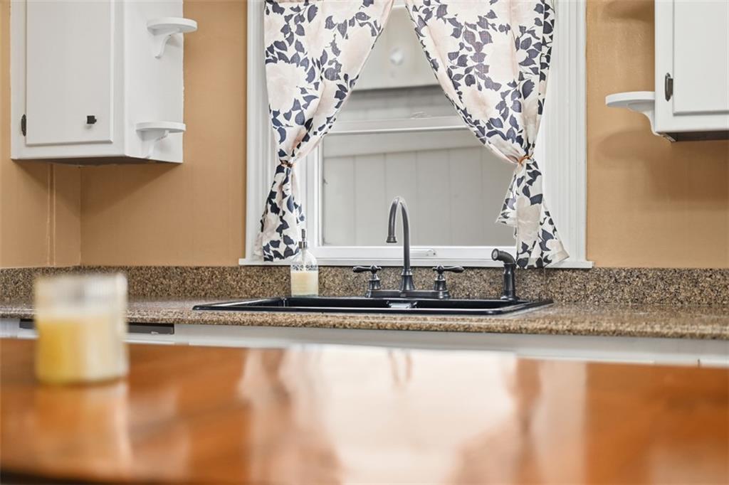 901 4th Avenue Freedom, PA 15042 - Photo 15 of 49 a kitchen with a sink and cabinets