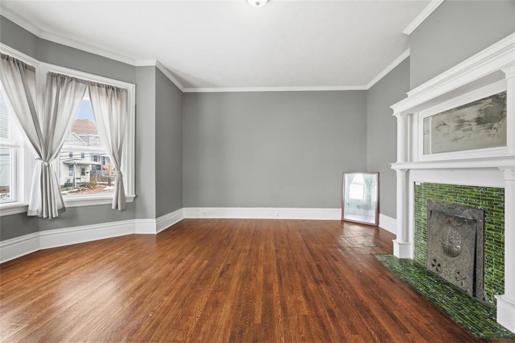 901 4th Avenue Freedom, PA 15042 - Photo 22 of 49 a view of an empty room with wooden floor and a window