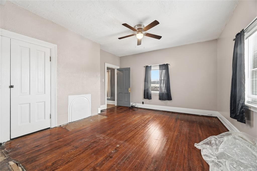 901 4th Avenue Freedom, PA 15042 - Photo 33 of 49 a view of an empty room with wooden floor and a window
