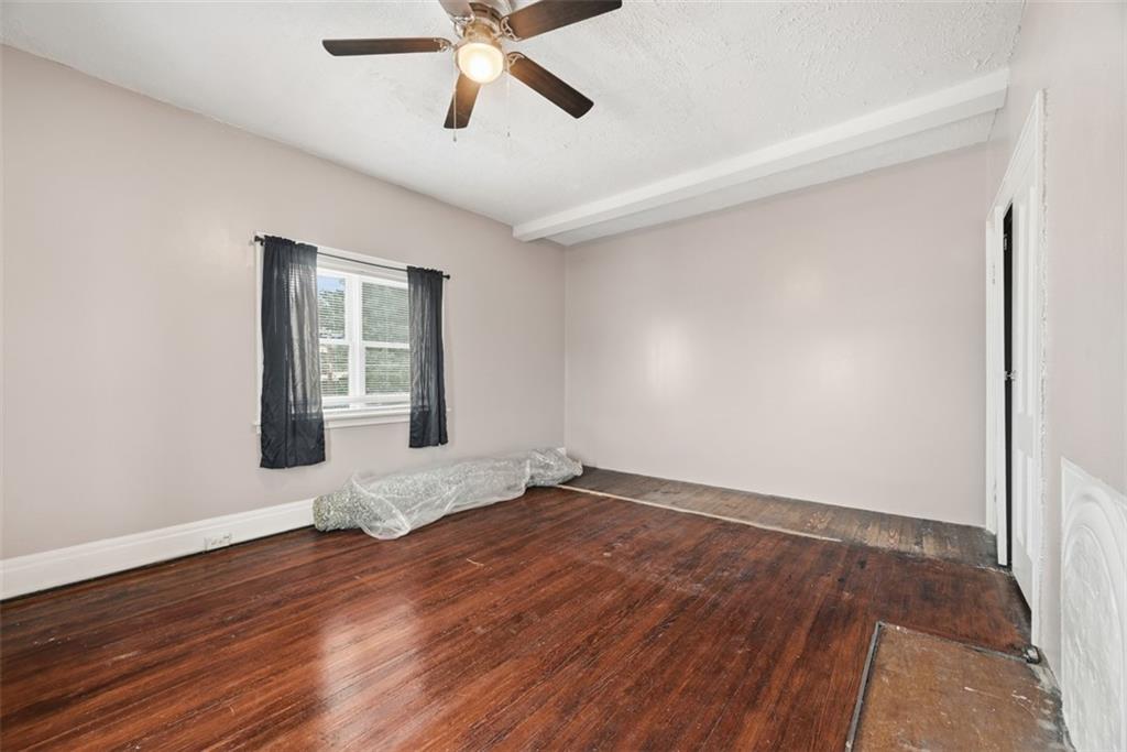 901 4th Avenue Freedom, PA 15042 - Photo 34 of 49 an empty room with wooden floor and windows