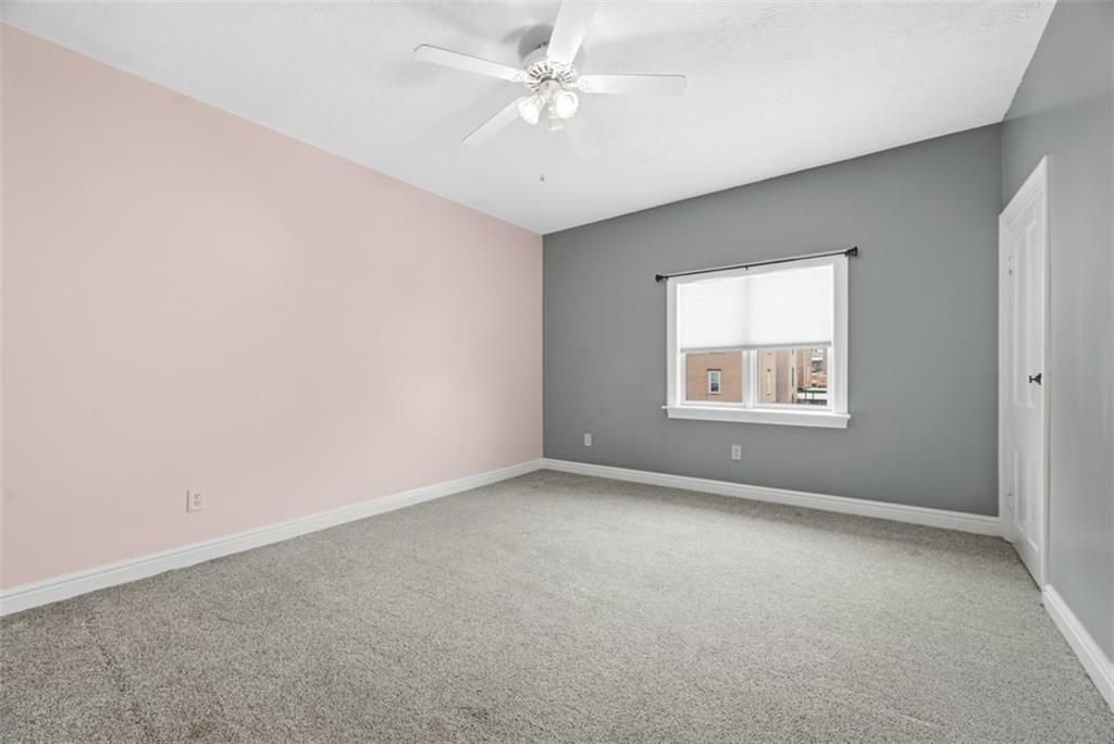 901 4th Avenue Freedom, PA 15042 - Photo 35 of 49 an empty room with windows and fan