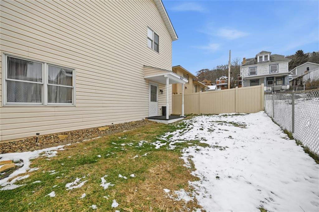 901 4th Avenue Freedom, PA 15042 - Photo 41 of 49 a view of a house with a wooden fence