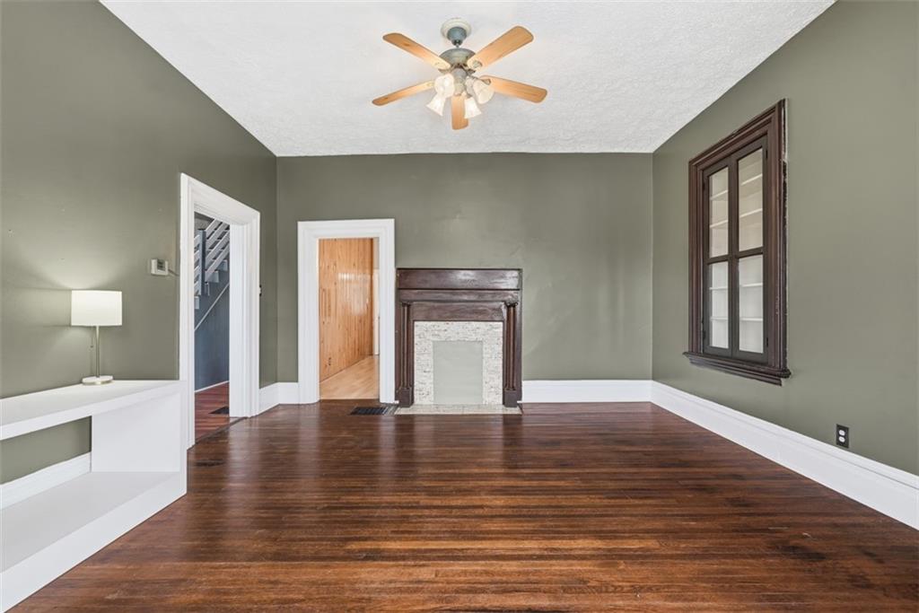 901 4th Avenue Freedom, PA 15042 - Photo 6 of 49 a view of an empty room with window and wooden floor