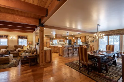 a view of a living room and dining room