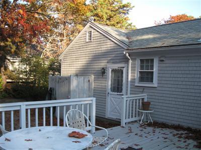 196 Oldham Road Osterville, MA 02655 - Photo 10 of 10 a view of a chair and table in backyard
