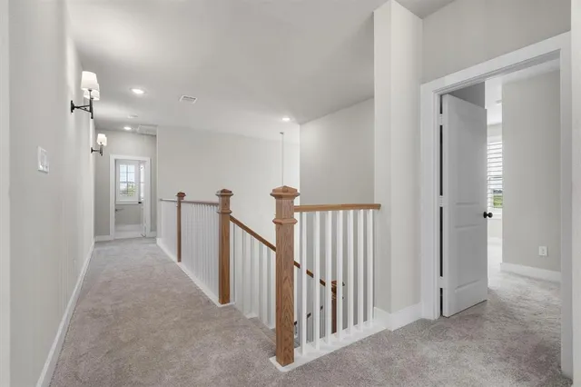 a view of a hallway with closet area