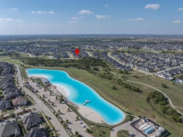 an aerial view of a swimming pool and outdoor space