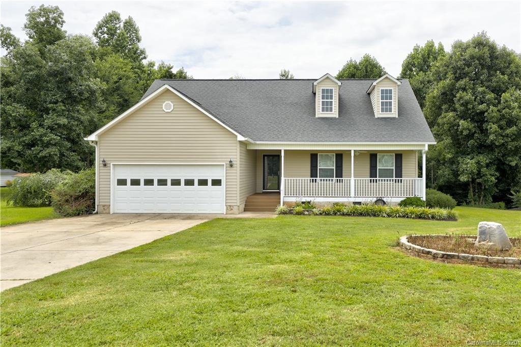 300 Springlake Road York, SC 29745 - Photo 1 of 46 a view of a house with a yard and a large tree