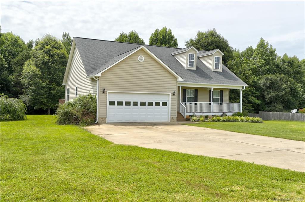 300 Springlake Road York, SC 29745 - Photo 3 of 46 a view of a big house with a yard and large trees