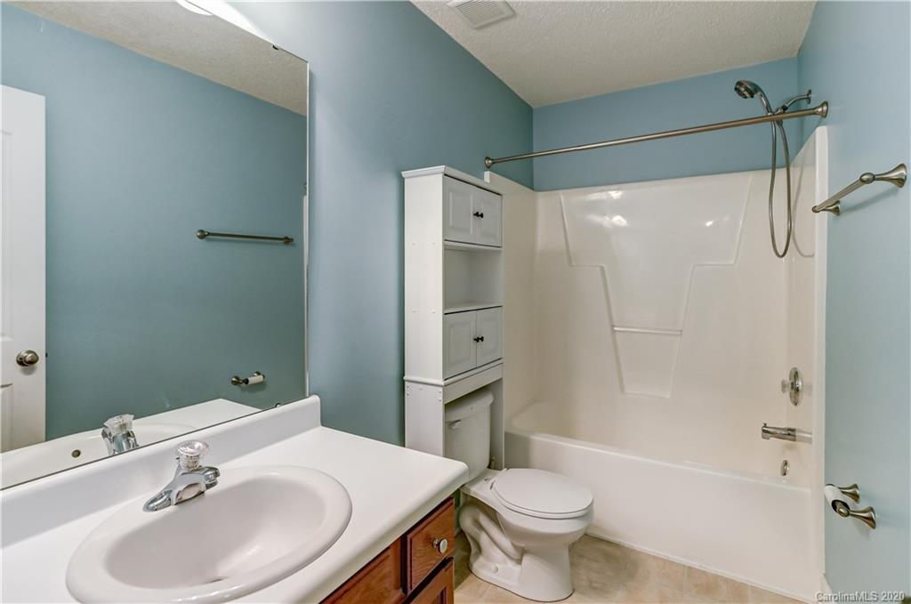 300 Springlake Road York, SC 29745 - Photo 29 of 46 a bathroom with a sink toilet and shower