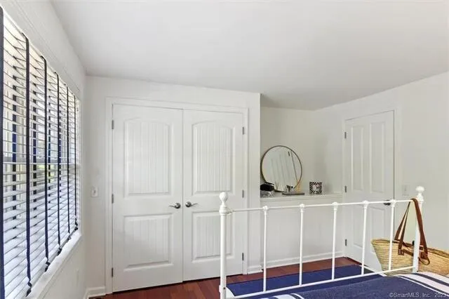 a view of a livingroom with furniture and wooden floor