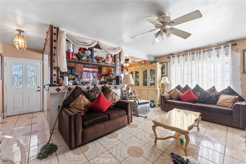 5300 Noble Street Riverside, CA 92503 - Photo 10 of 26 a living room with furniture and a flat screen tv